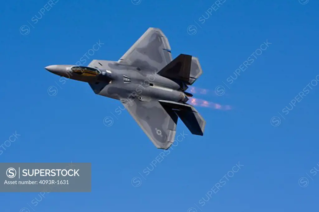 US Air Force Lockheed Martin Boeing F-22 Raptor performing an aerial demonstration at the 2008 Reno Air Races. It is primarily an air superiority fighter. Afterburners on. US Air Force Lockheed Martin Boeing F-22 Raptor performing an aerial demonstration at the 2008 Reno Air Races. It is primarily an air superiority fighter. Afterburners on.