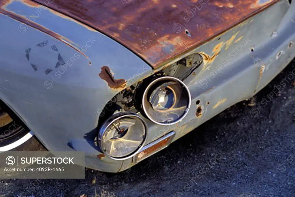 junkyard scrapyard old rust broken down grey detail broken headlights