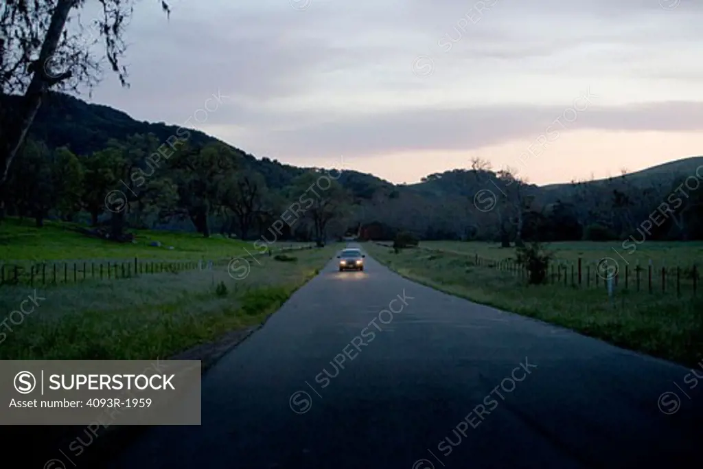distant car on Country Road Landscape Scenic