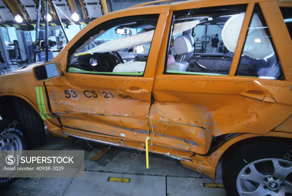 Side impact crash test of a BMW X5 at the Ascheim test facilities near Munich, Germany in 2000. The impact speed is 38.5 mph. Accident testing. airbag deployed
