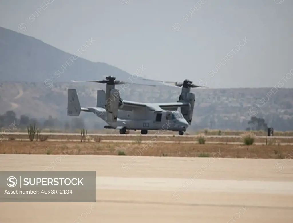 Bell Helicopter Textron Boeing V-22 Osprey VTOL STOL tiltroter aircraft. Flown by the US Marine Corps. The Department of Defense began the V-22 program in 1981. Full-scale development of the V-22 tilt-rotor aircraft began in 1986.