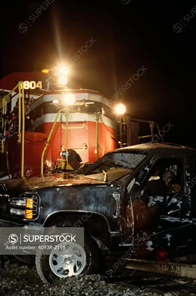 Aftermath of a staged grade crossing accident between a GP 40 and a Chevy Suburban for Warner Bros. production of Lethal Weapon 4. Accident was staged at the North Main Street crossing of the Union Pacific at the Los Angeles River.  March 11th, 1998.
