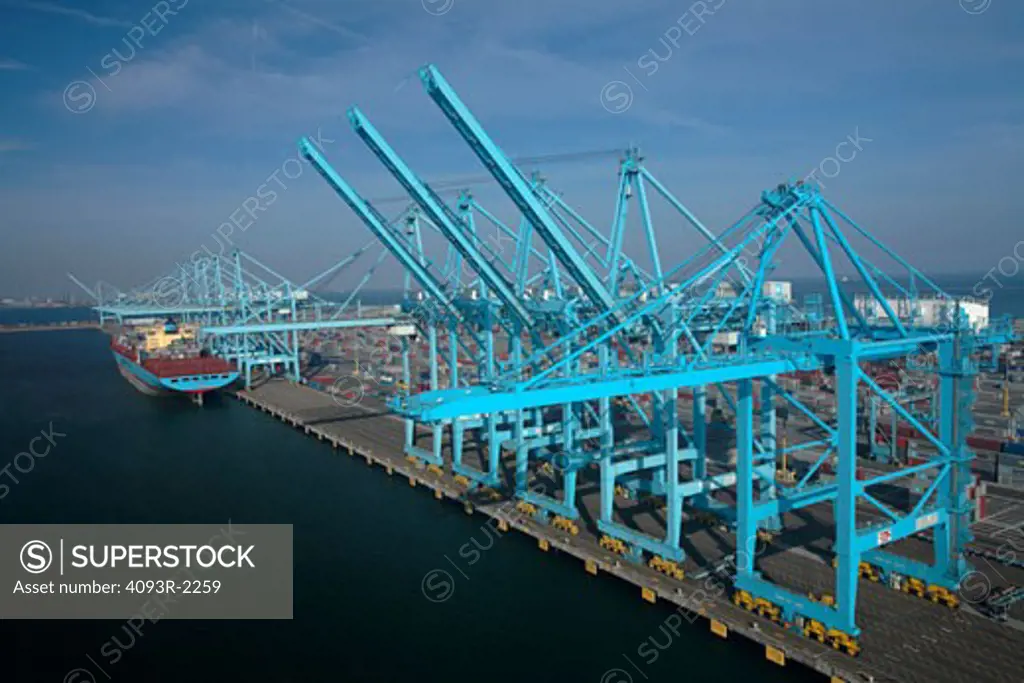 Susan Maersk container ship being loaded and unloaded at the Maersk terminal at the Port of Long Beach, California.
