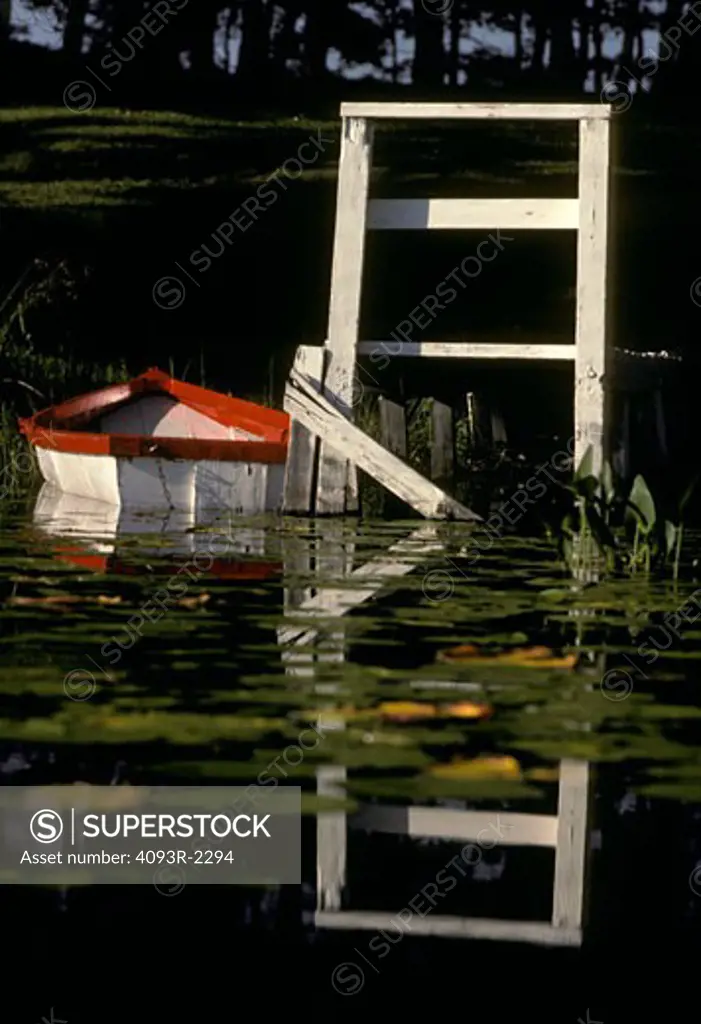 rowboat shore lily pads nostalgia