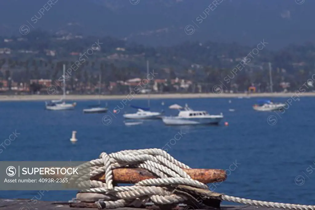 cleat rope dock tie down sailboats moored bay harbor nostalgia