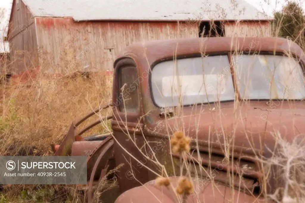 1930s rusted pickup truck and barn, western Wisconsin
