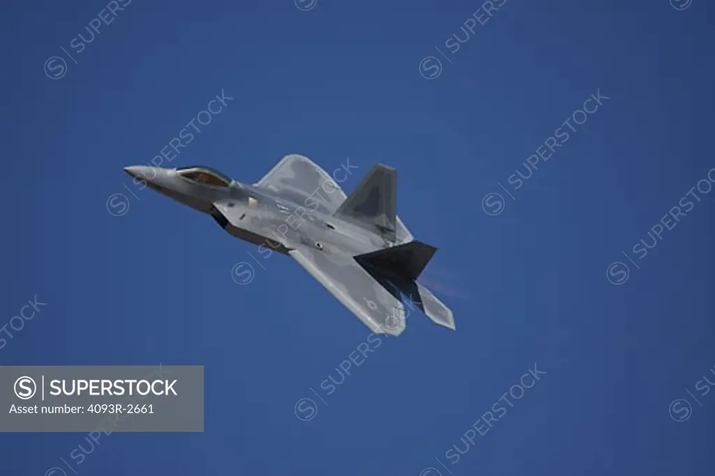 Lockheed Martin/Boeing USAF F-22 Raptor, 3/4 side view fly by during the Reno Air Races.