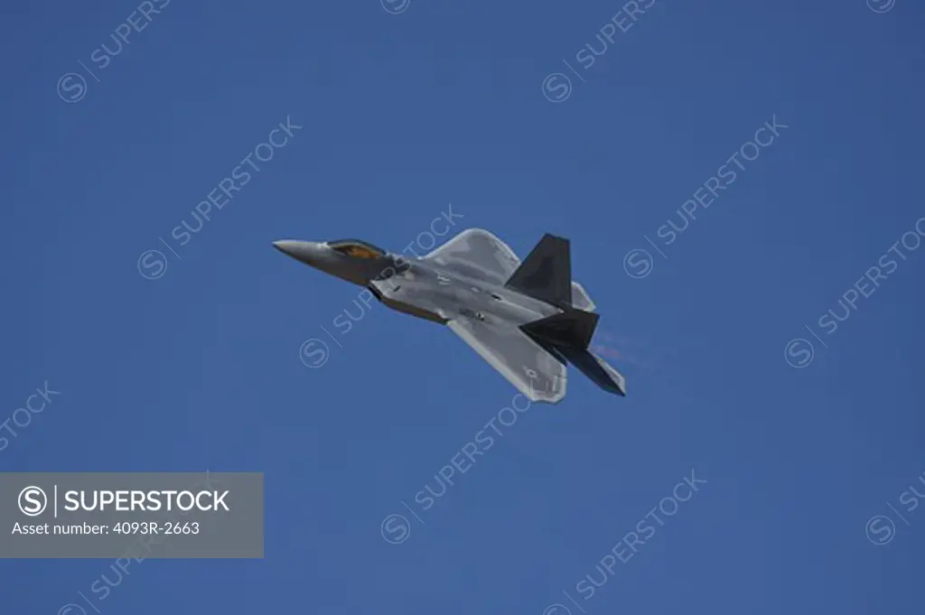 Lockheed Martin/Boeing USAF F-22 Raptor 3/4 side view fly by during the Reno Air Races.