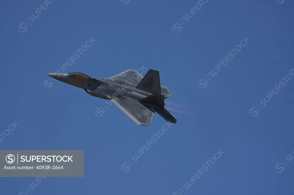 Lockheed Martin/Boeing USAF F-22 Raptor, side view fly by during the Reno Air Races.