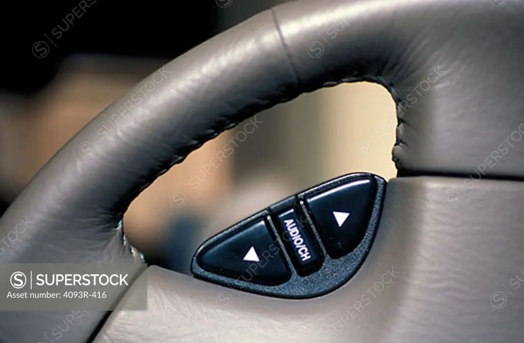 interior detail Honda Accord 2001 steering wheel mounted audio control volume channel
