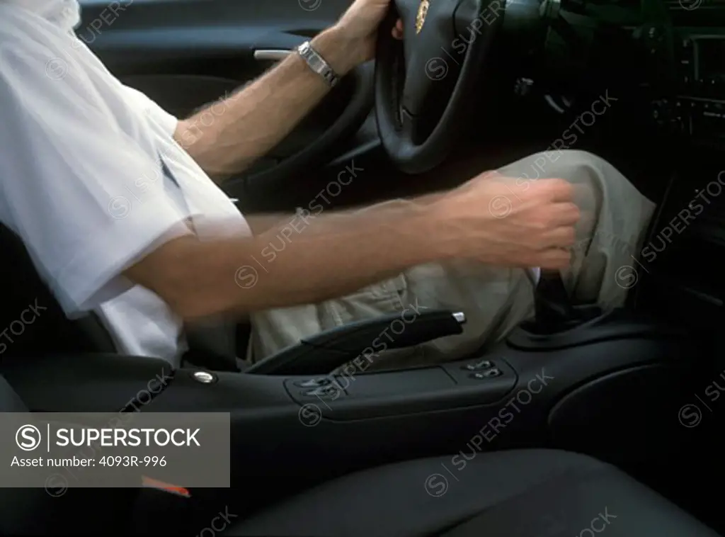 interior Porsche 911 Carrera black leather seats emergency brake gear shift shifting arm white shirt