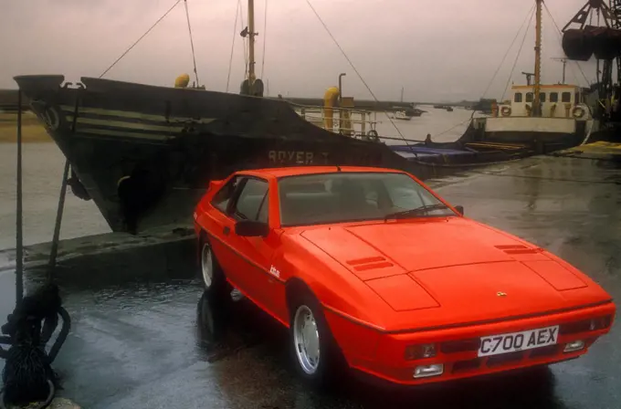 1985 Lotus Excel SE parked at docks, front 3/4