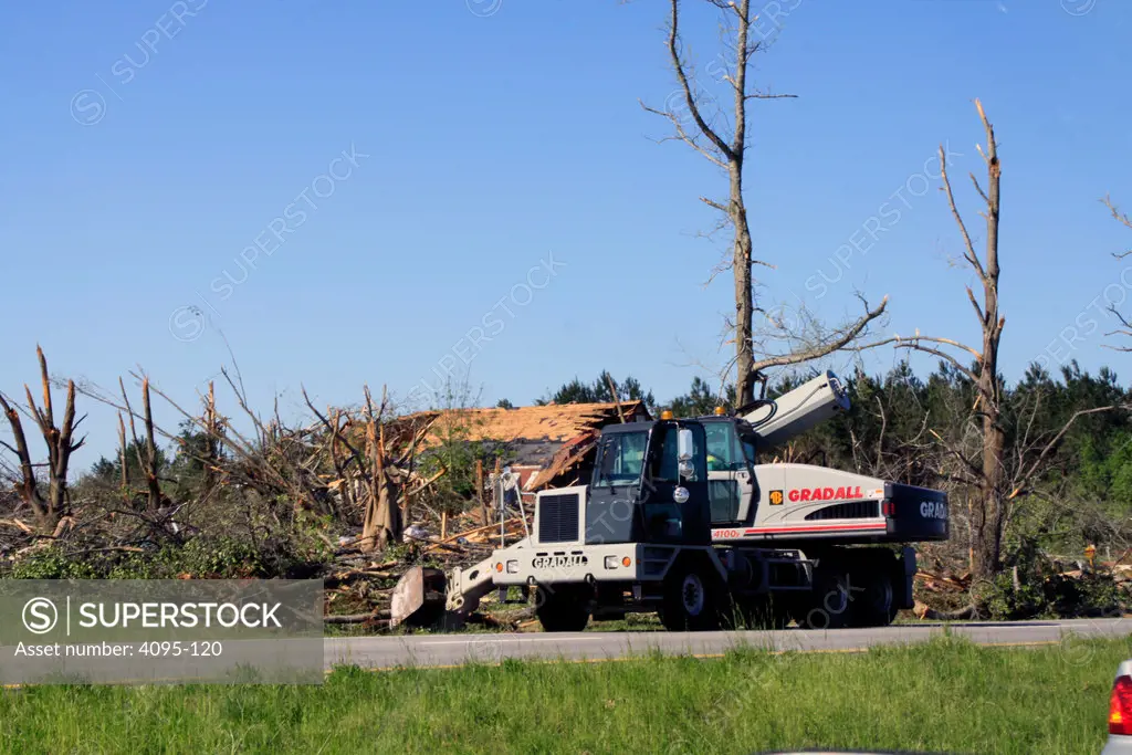 State highway crew cleaning debris from a road after a tornado, Limestone County, Alabama, USA