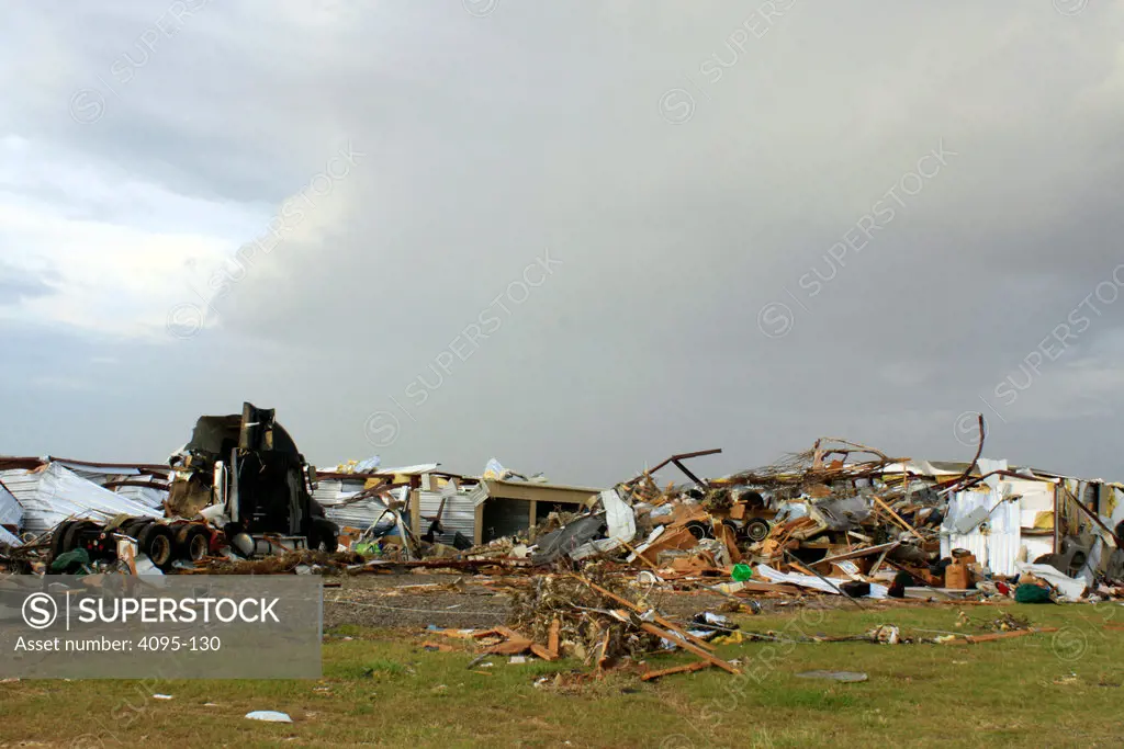 Semi-truck with storage buildings damaged by tornado, Tanner, Limestone County, Alabama, USA