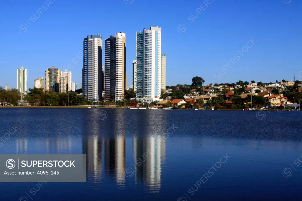 Brazil, Campo Grande, part of city and its reflection in lake in Indigenous Nations Park