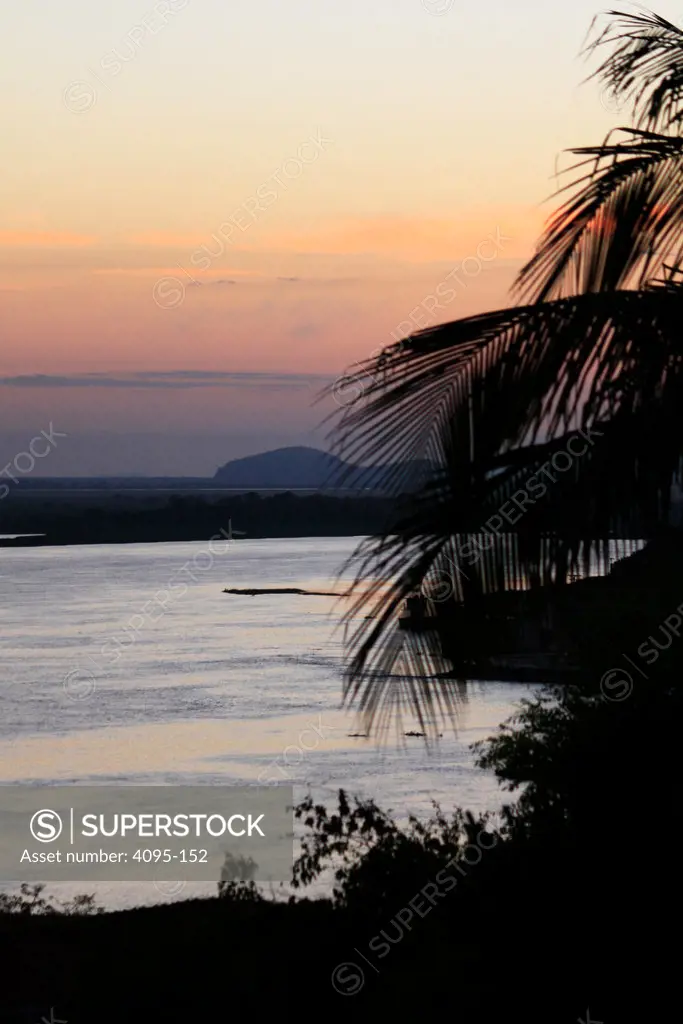 Brazil, Corumba, Sunset on river and large wetland