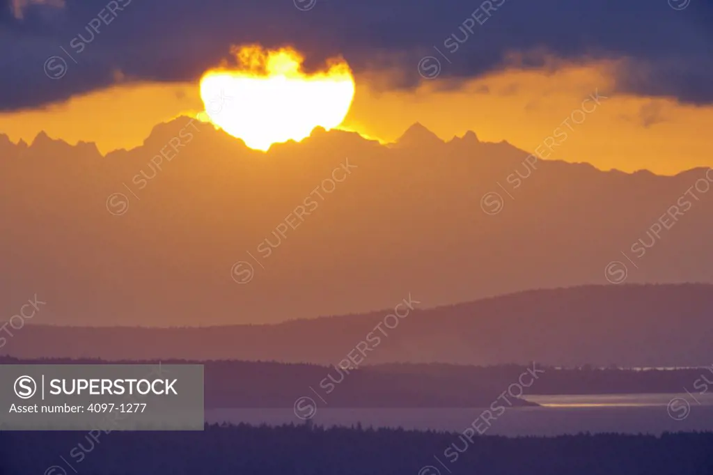 Sunrise over an island, Saanich Peninsula, Vancouver Island, British Columbia, Canada