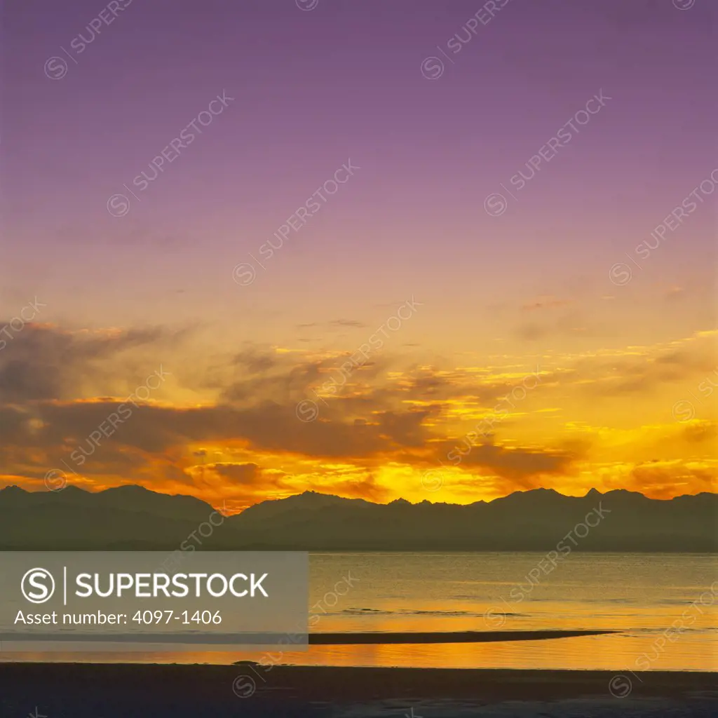 Silhouette of mountains at twilight, Rathtrevor Beach Provincial Park, Parksville, Vancouver Island, British Columbia, Canada