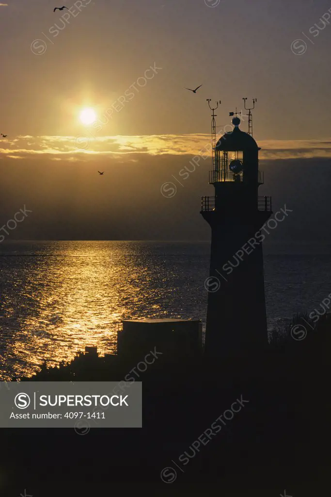 Silhouette of a lighthouse at sunset, Sheringham Point Lighthouse, Vancouver Island, British Columbia, Canada