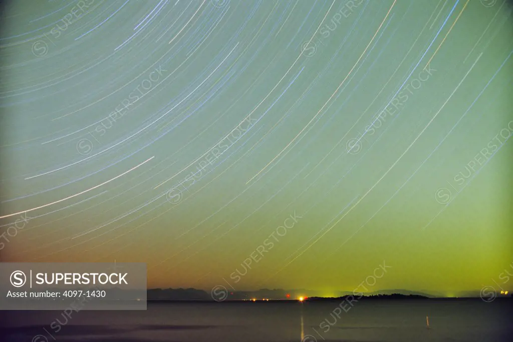 Star trails over the ocean, Rathtrevor Beach Provincial Park, Parksville, Vancouver Island, British Columbia, Canada