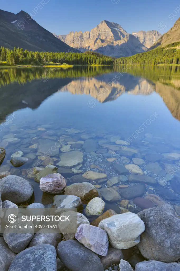 Reflection of mountains in water, Mount Grinnell, Swiftcurrent Lake, US Glacier National Park, Montana, USA