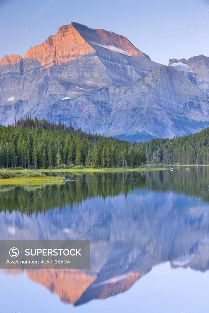 Reflection of a mountain in a lake, Mt. Grinnell, Swiftcurrent Lake, US Glacier National Park, Montana, USA