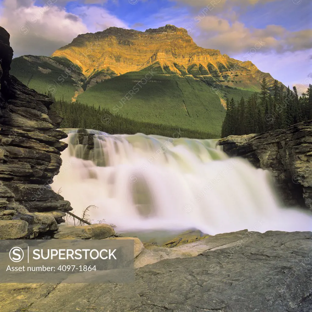 Waterfall with a mountain in the background, Athabasca Falls, Mt Kerkeslin, Jasper National Park, Alberta, Canada