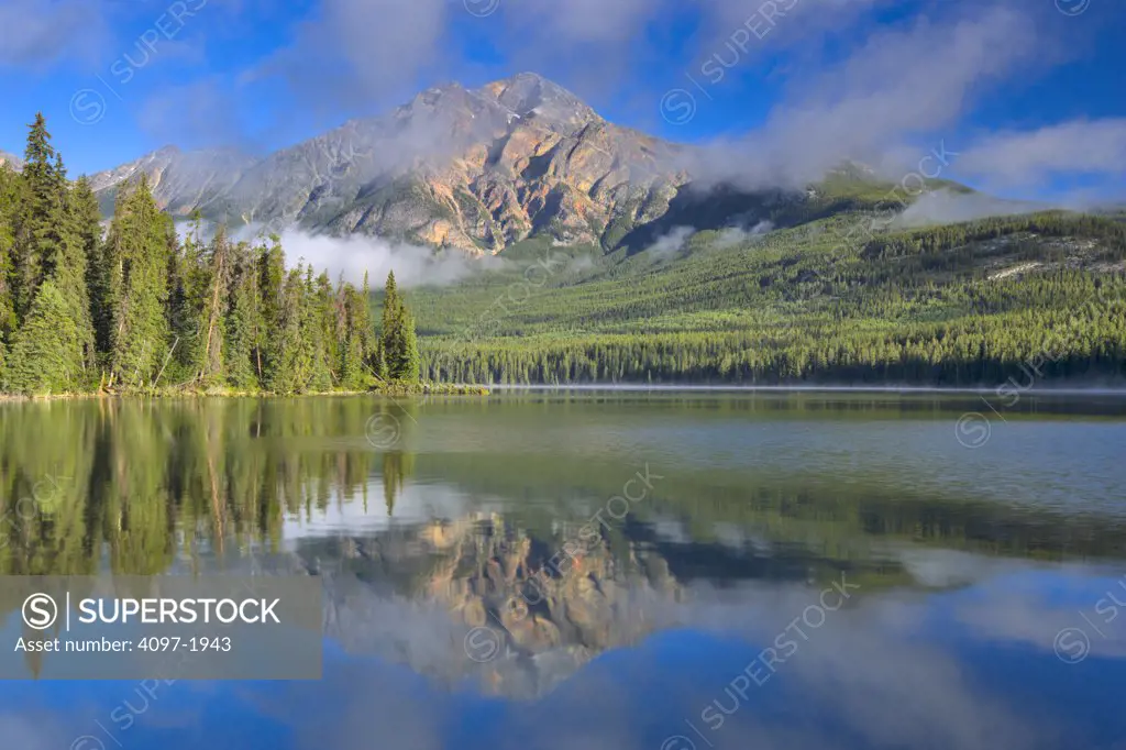 Reflection of a mountain in water, Pyramid Lake, Pyramid Mountain, Jasper National Park, Alberta, Canada