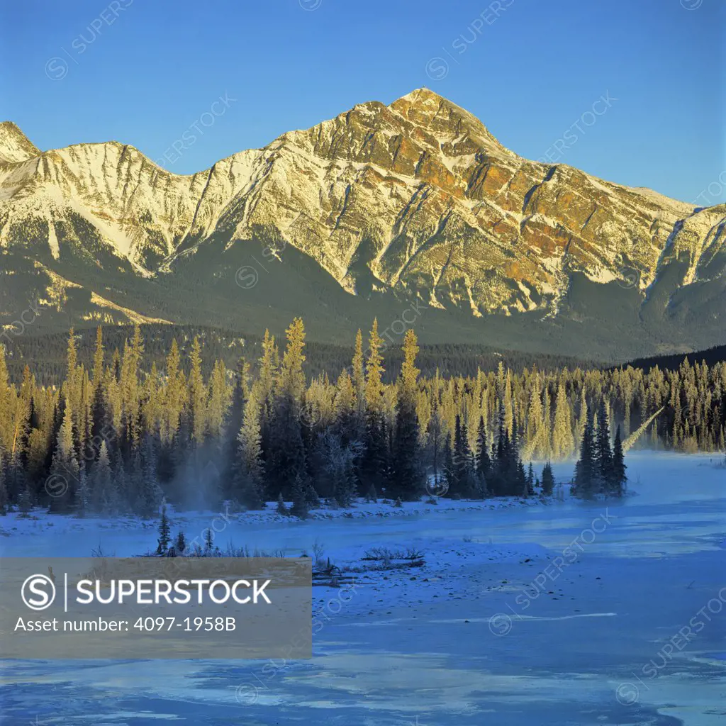 River in front of mountains, Athabasca River, Pyramid Mountain, Jasper National Park, Alberta, Canada