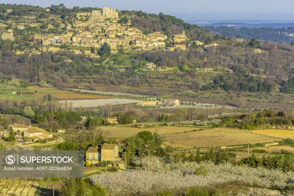 Town of La Costa on distant hill, Provence, France