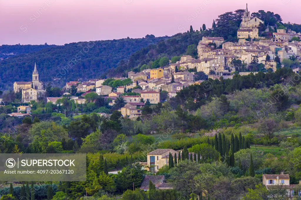 Hill town of Bonnieux in Provence region at dusk, France