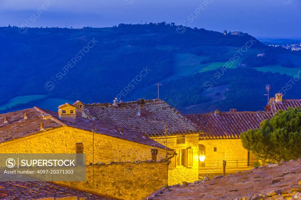 street lamp at dusk in hill town, Tuscany