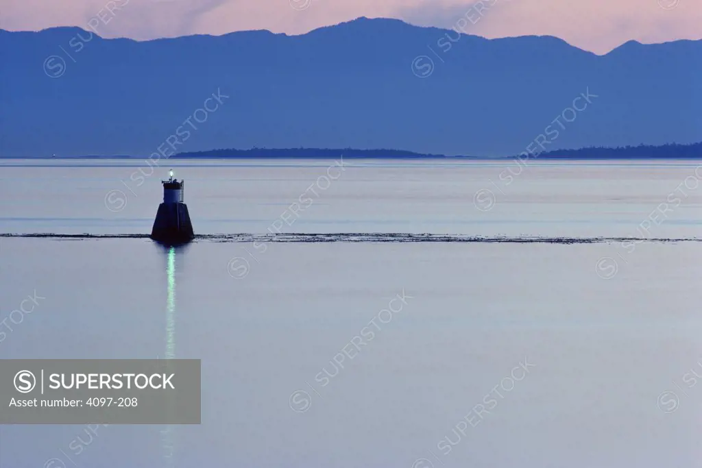 Buoy in the sea, Olympic Mountains, Victoria, Vancouver Island, British Columbia, Canada