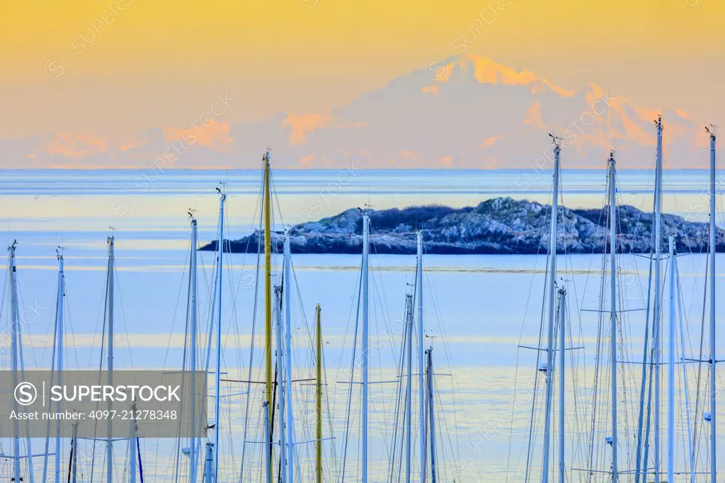 Boat marina and Mount Baker seen from Vancouver Island