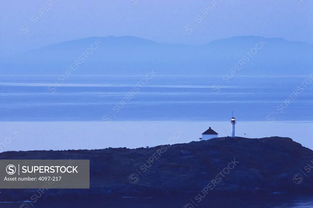 Lighthouse on a cliff, Trial Island Lighthouse, Victoria, Vancouver Island, British Columbia, Canada