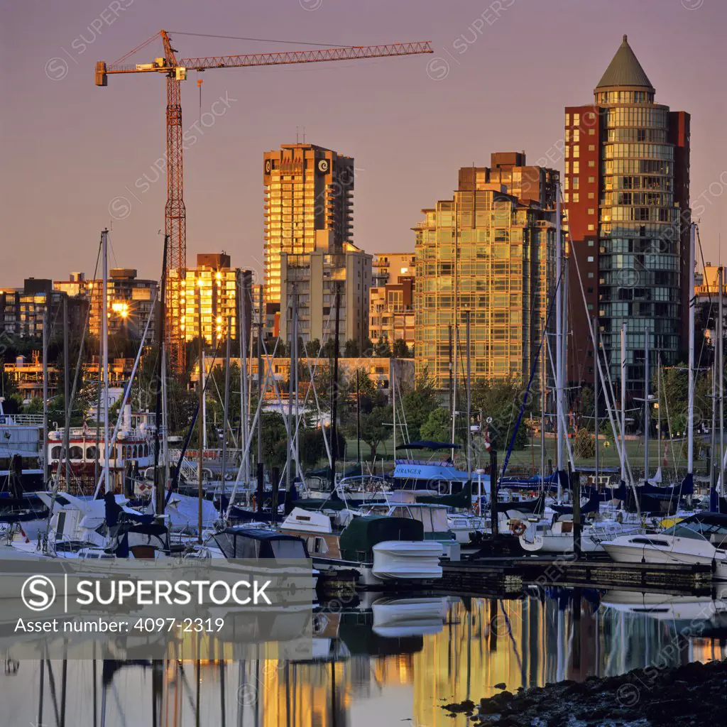 Boats moored at a harbor, Coal Harbor, Vancouver, British Columbia, Canada