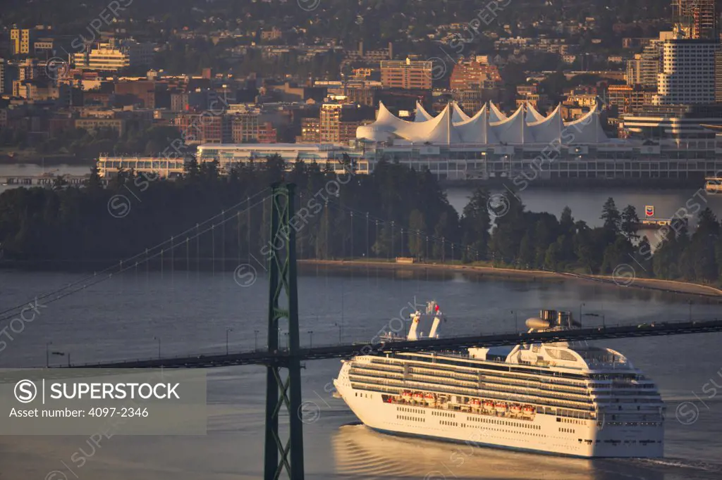 Cruise ship passing under a suspension bridge, Lions Gate Bridge, Vancouver, British Columbia, Canada