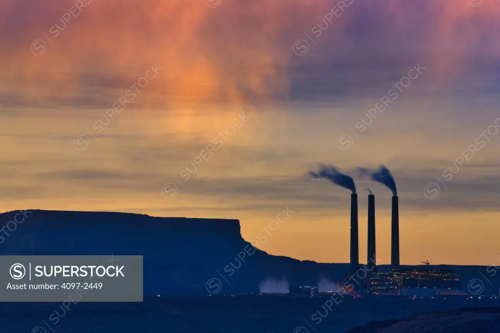 Smoke emitting from smoke stacks at a power station, Navajo Generating Station, Page, Arizona, USA