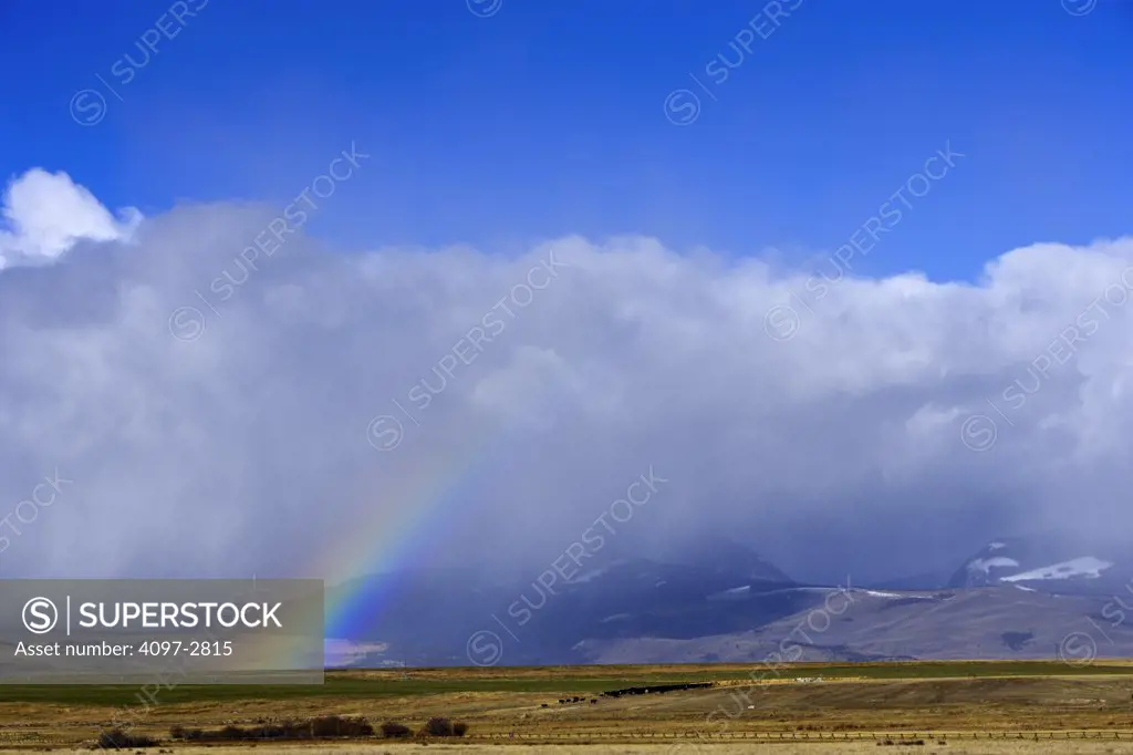 Rainbow over mountains, Three Forks, Gallatin County, Montana, USA