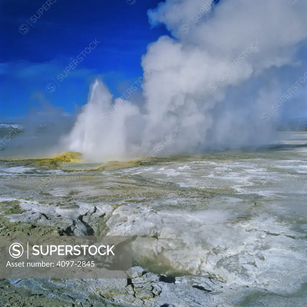 Eruption from a geyser, Clepsydra Geyser, Lower Geyser Basin, Yellowstone National Park, Wyoming, USA