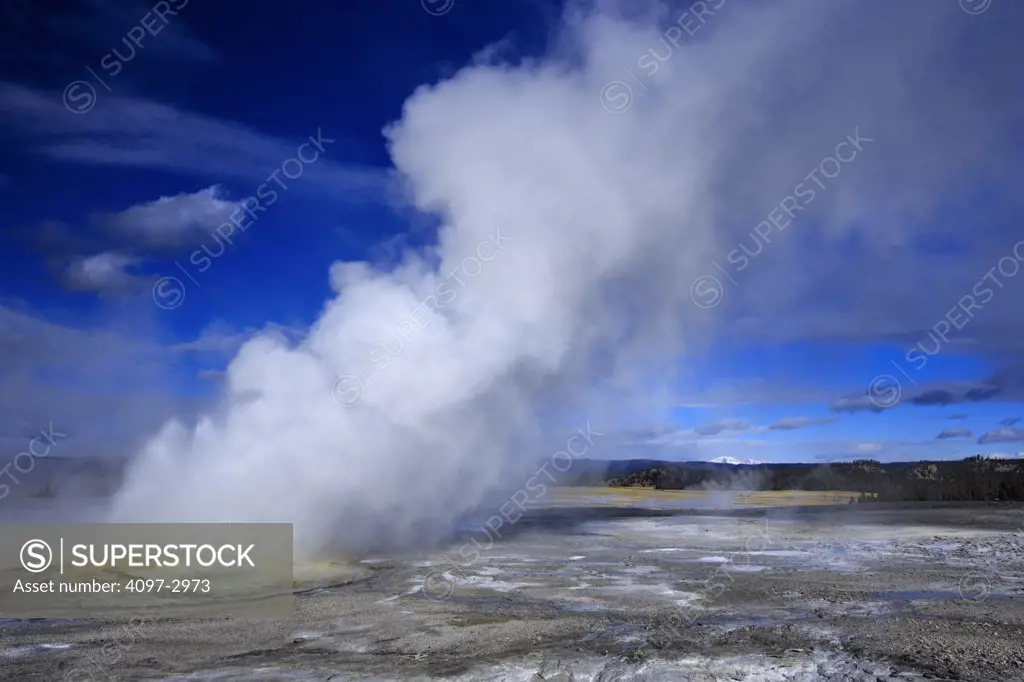 Steam erupting from a geyser, Clepsydra Geyser, Lower Geyser Basin, Yellowstone National Park, Wyoming, USA