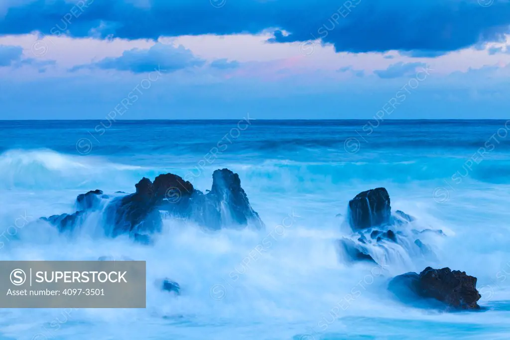 Rock formations in the ocean, Hookipa Beach, Maui, Hawaii, USA