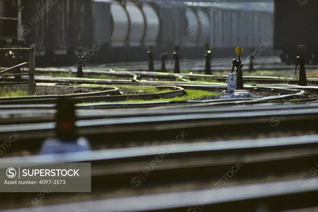 Railroad tracks with train moving on tracks, Winnipeg, Manitoba, Canada
