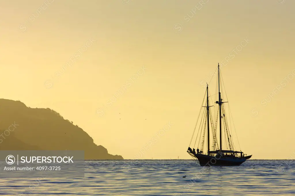 Sailboat in the bay at sunset, Sausalito, Marin County, California, USA