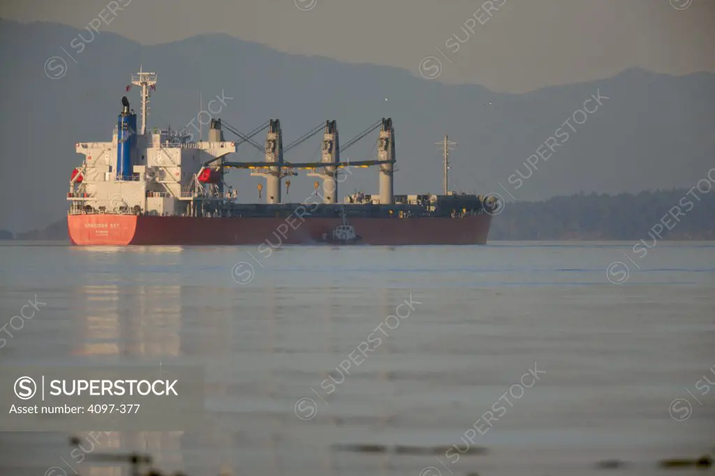 Container ship in the sea, Olympic Mountains, Strait Of Georgia, Victoria, Vancouver Island, British Columbia, Canada