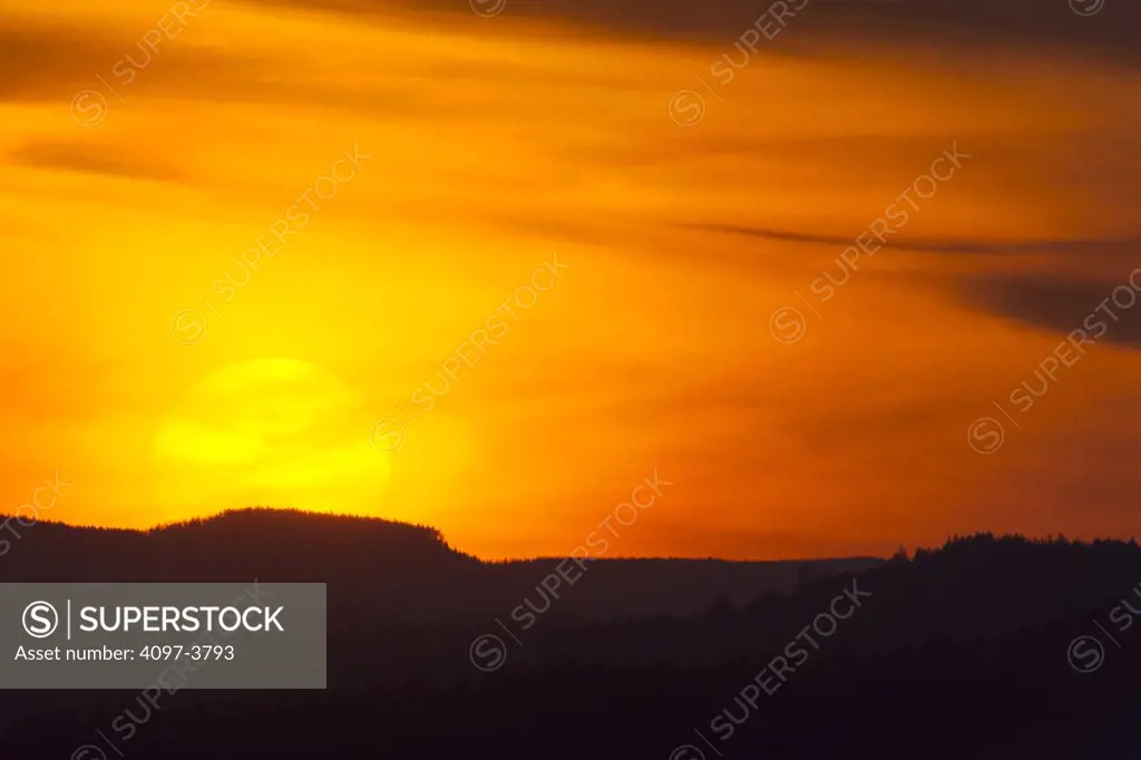 Sunset over mountains, Highlands, Saanich Peninsula, Victoria, British Columbia, Canada