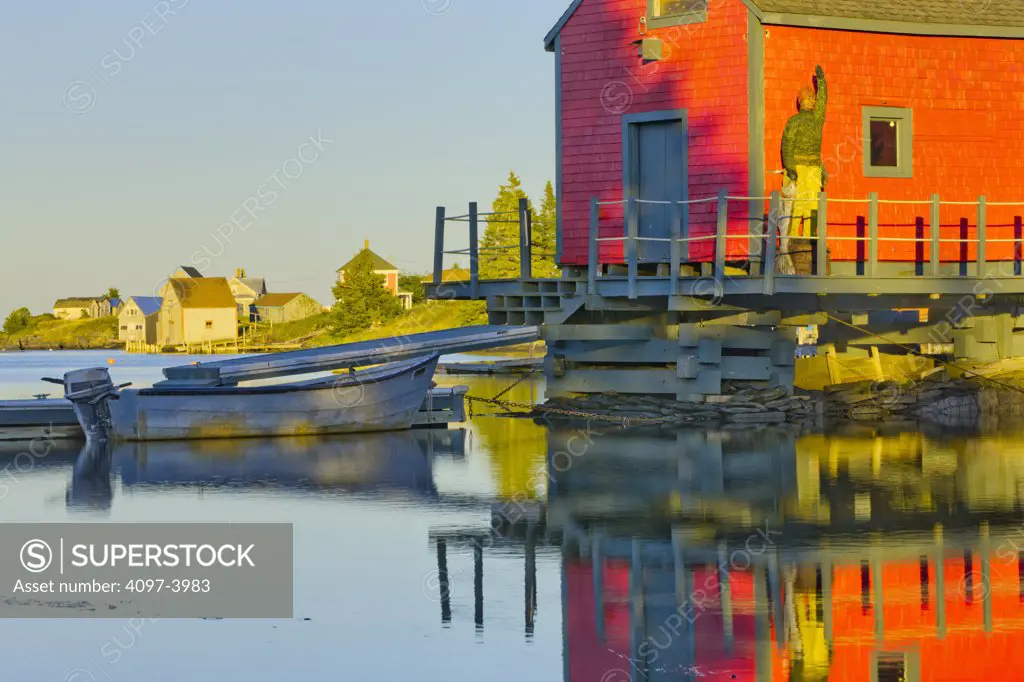 Reflection of a boat shed in water, Stonehurst East, Nova Scotia, Canada
