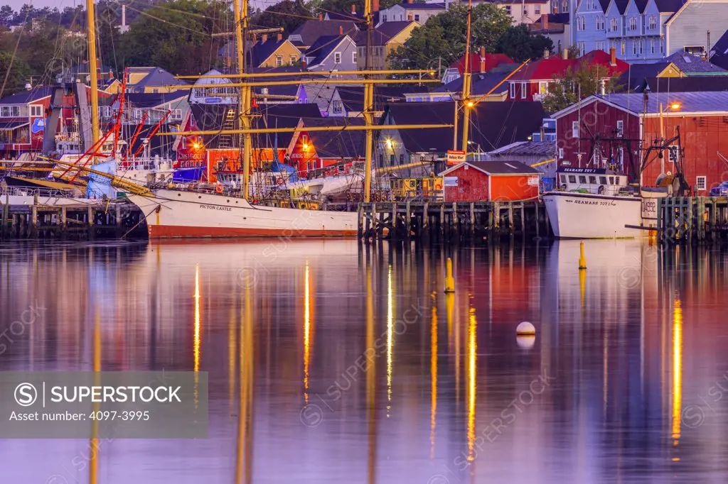 Reflection of boats and buildings in water, Lunenburg, Nova Scotia, Canada