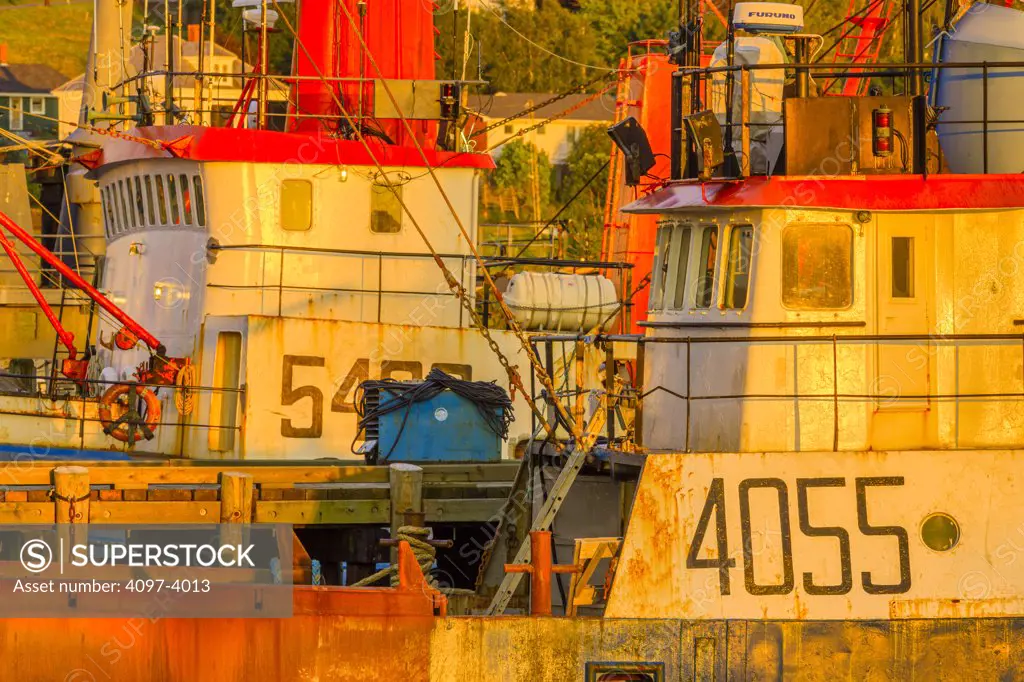Fishing boats docked at a harbor, Lunenburg, Nova Scotia, Canada