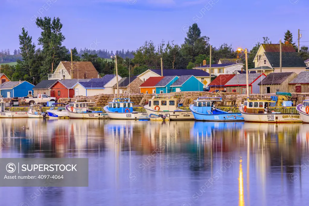 Reflection of fishing boats on water, Cape Turner, Prince Edward Island, Canada